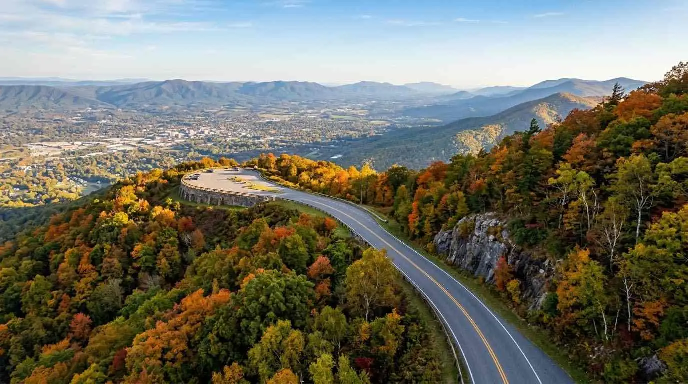 Roanoke and Roanoke Valley motorcycle guide showing a scenic winding mountain road in Virginia.